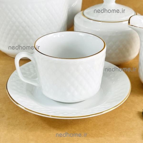 فنجان و نعلبکی چینی زرین طرح سفید لب طللایی دور برجسته